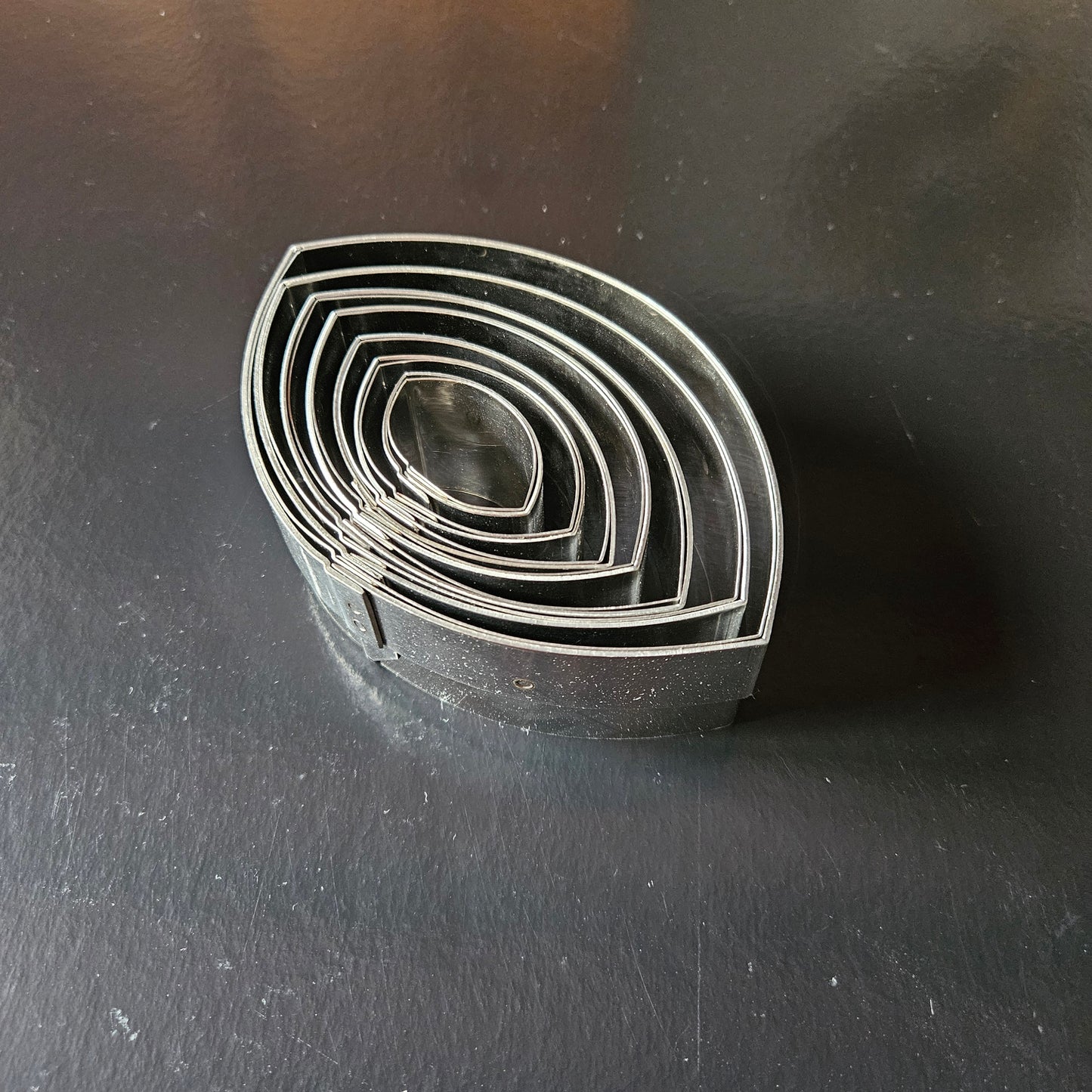 Boîte de 7 découpoirs inox ovales unis