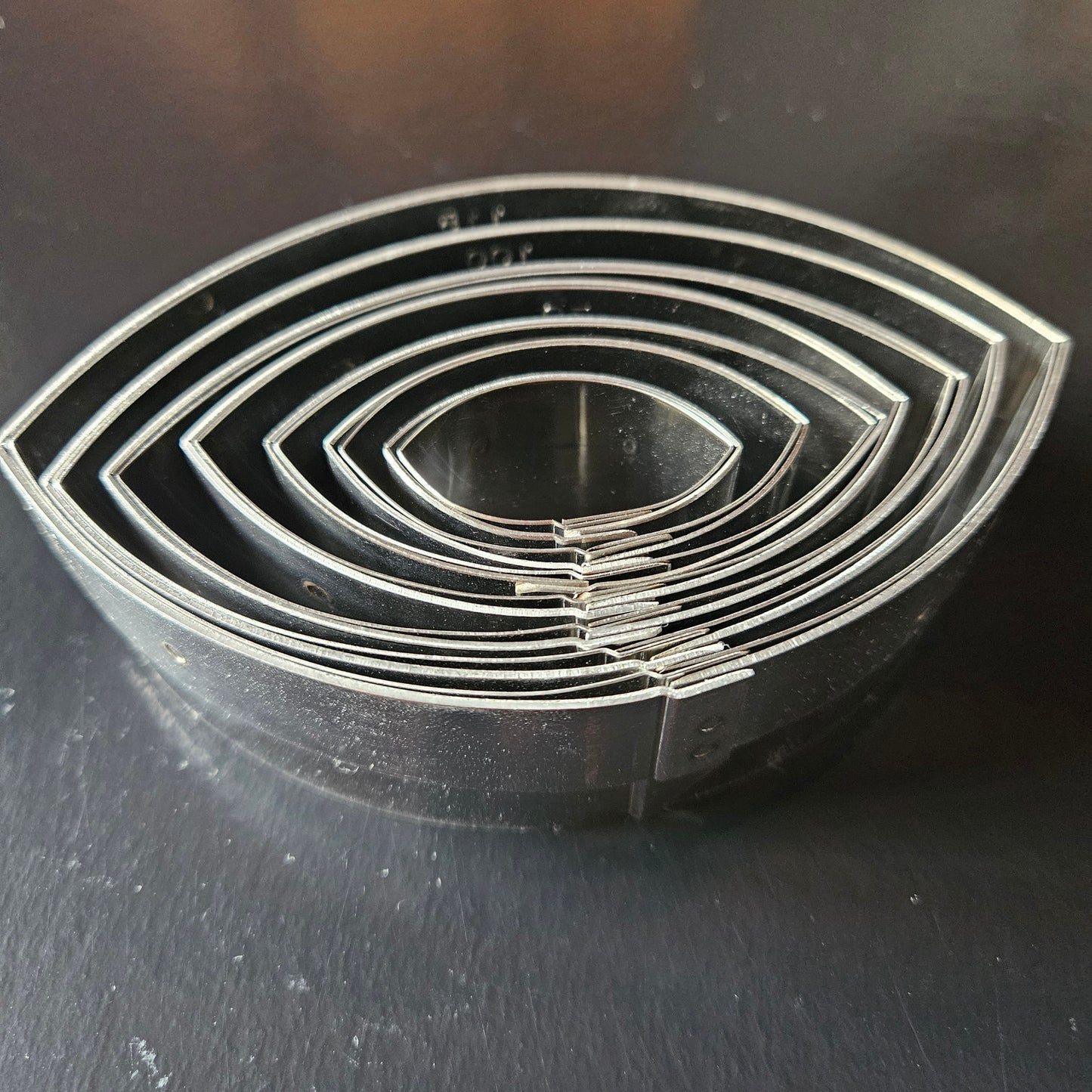 Boîte de 7 découpoirs inox ovales unis