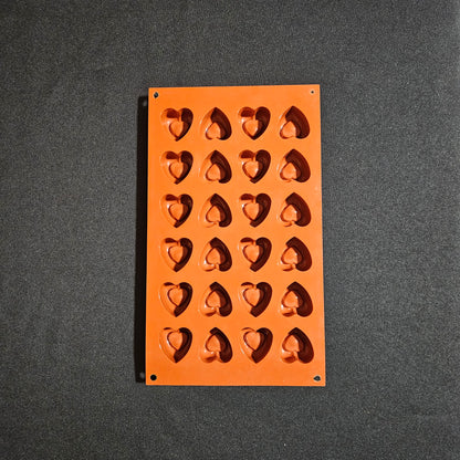 Moule en silicone mini  cœurs creusés Silikomart