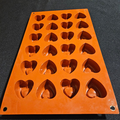 Moule en silicone mini  cœurs creusés Silikomart