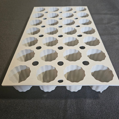 Moule en silicone 28 mini cannelés De Buyer