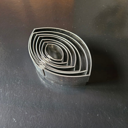 Boîte de 7 découpoirs inox ovales unis