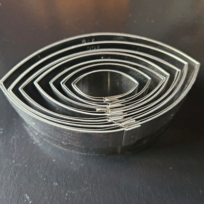 Boîte de 7 découpoirs inox ovales unis