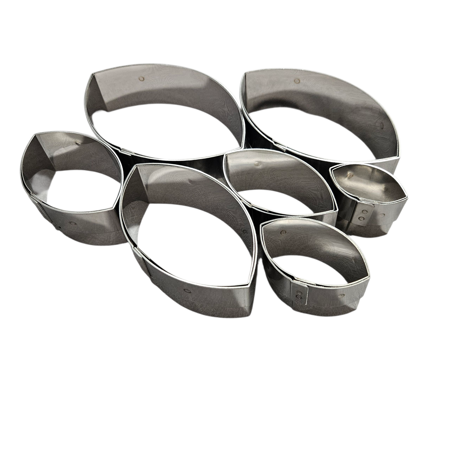 Boîte de 7 découpoirs inox ovales unis